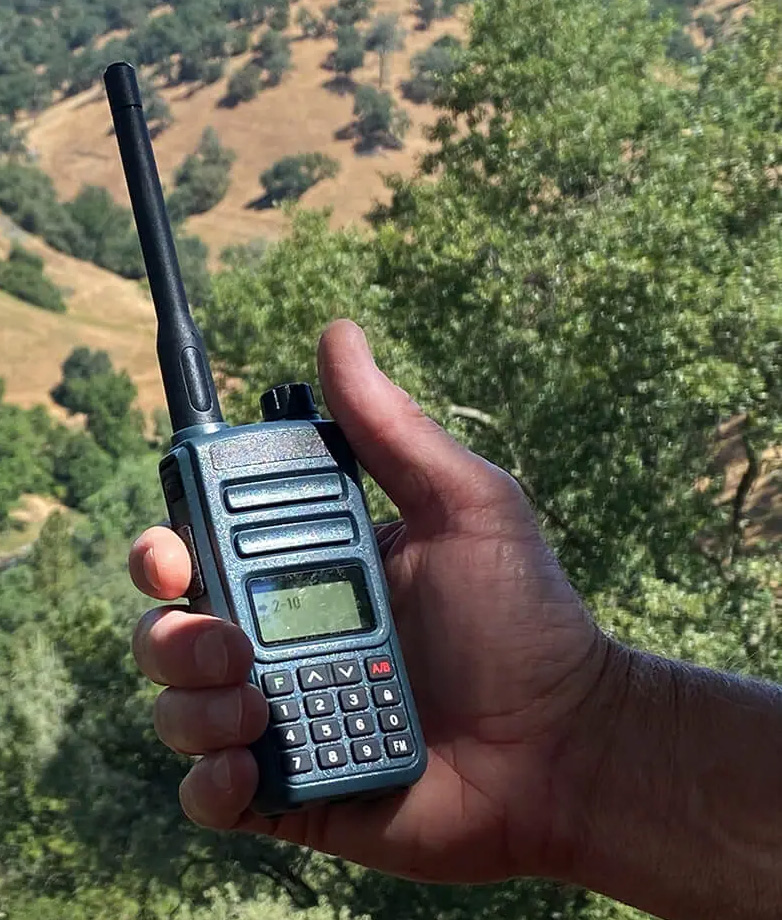 Man with a walkie-talkie in his hand